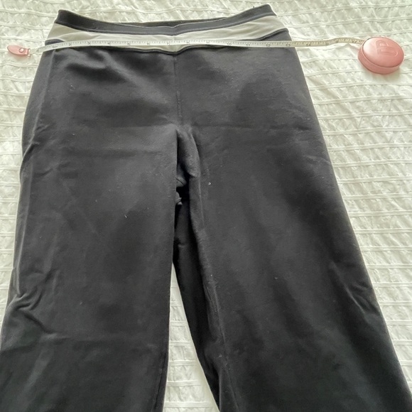 Lululemon black wide leg crop yoga pants. Size 4. White mesh detailing. - Picture 8 of 8